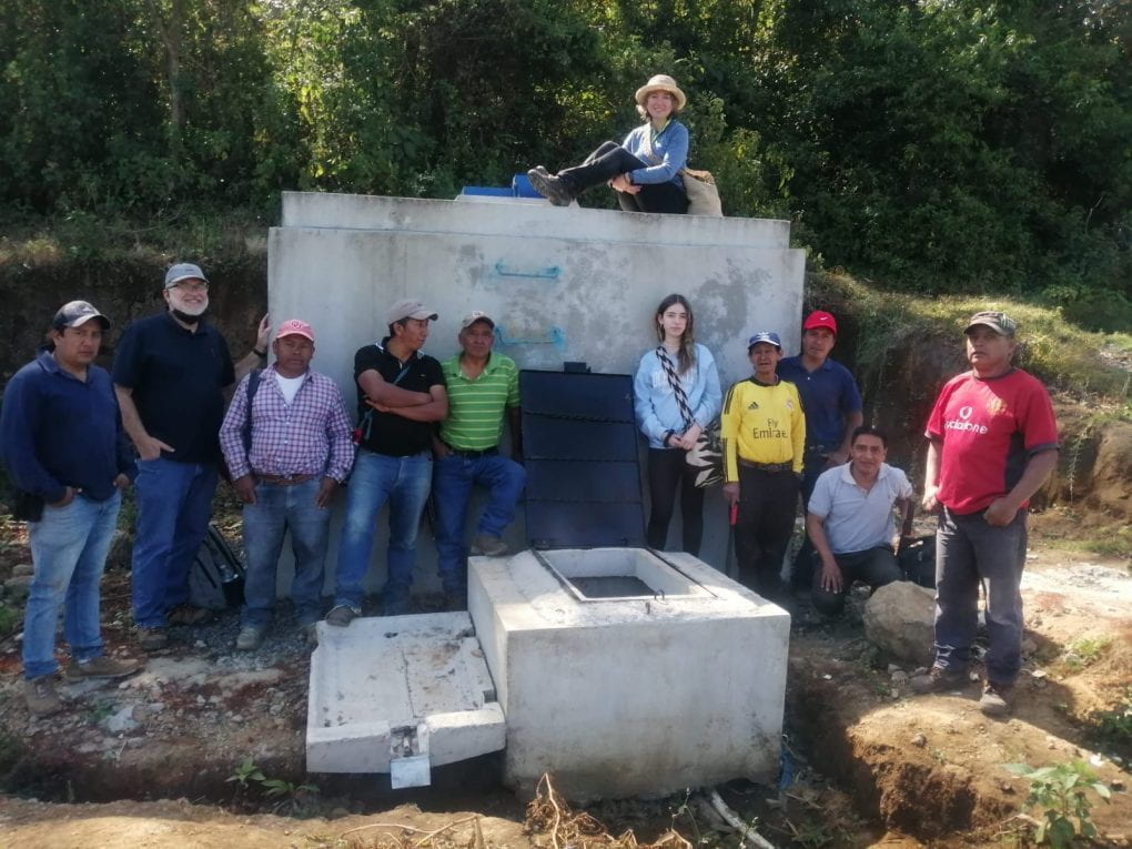 Representatives of the water committee and indigenous local council at water tank for Panacal sector of Panyebar