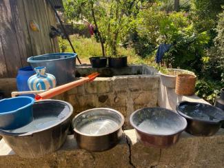 Pots of water on a ledge in Guatemala